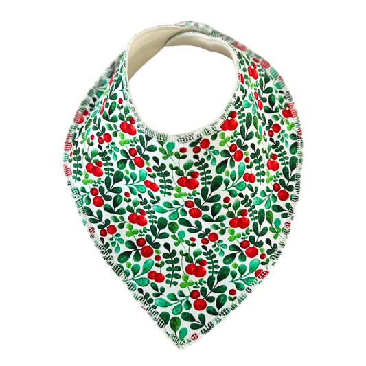 Ekologisk dregglis med rött och grönt lingonris på vit botten. Fodrad med mjuk bomullsfleece och sydd av By Lelou.